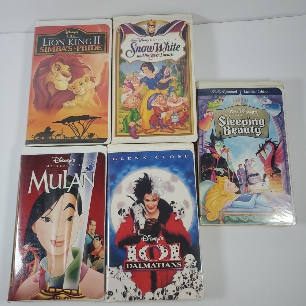 Lot of Five Classic Disney VHS Movies. Snow White Sleeping Beauty Mulan Mulan
